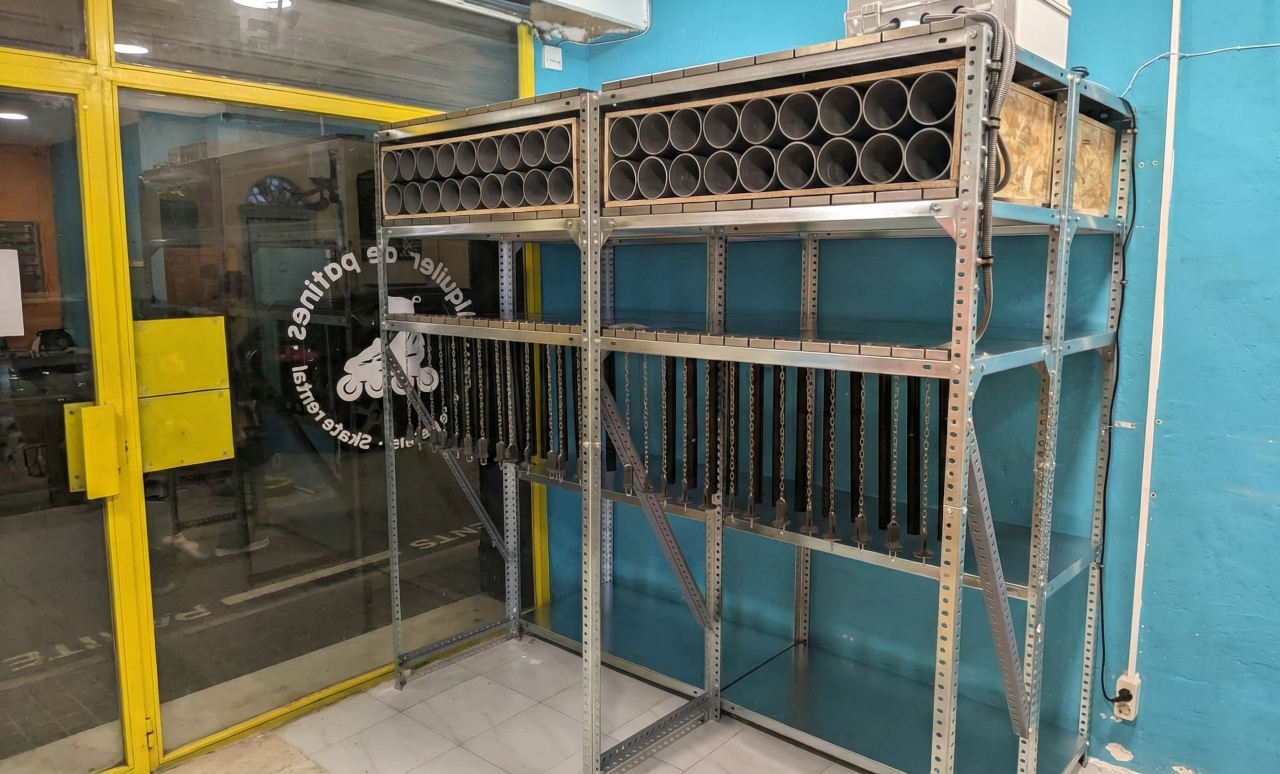 Smart Rack V2 with 62 electric locks featuring custom cylindrical compartments to prevent umbrella tangling